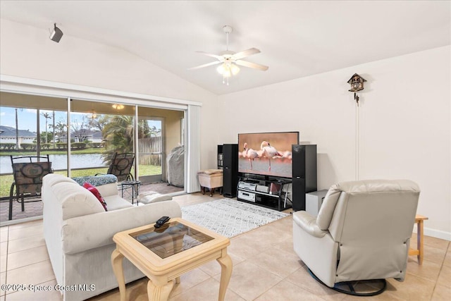 tiled living room featuring lofted ceiling and ceiling fan