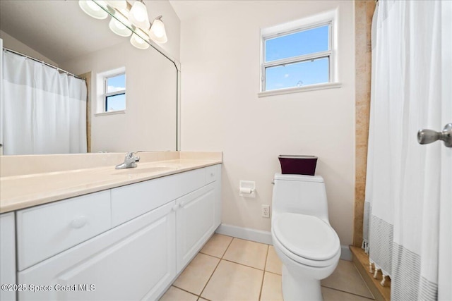 bathroom featuring tile patterned flooring, vanity, toilet, and a shower with shower curtain