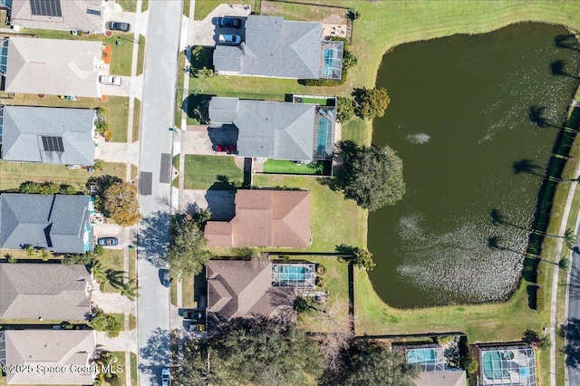 drone / aerial view featuring a water view