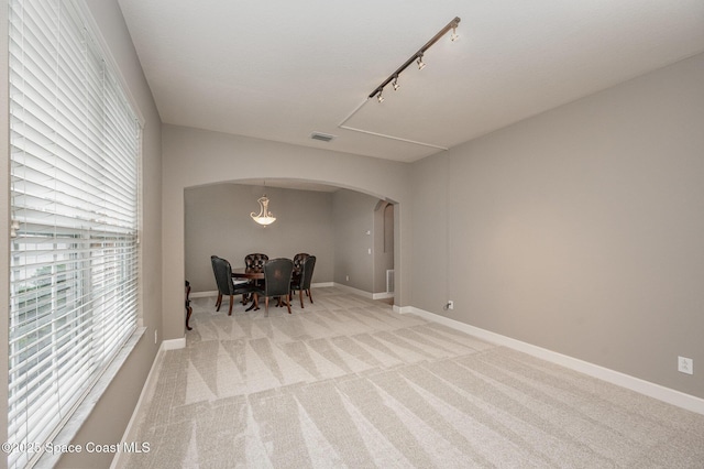 view of carpeted dining space