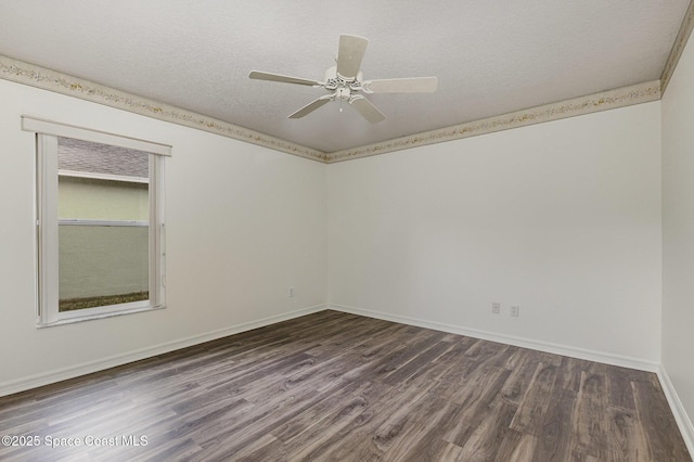 empty room with ceiling fan, a textured ceiling, and dark hardwood / wood-style floors