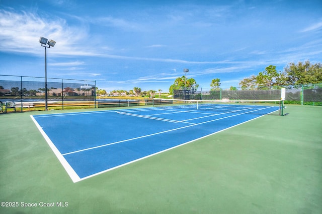 view of sport court featuring basketball hoop