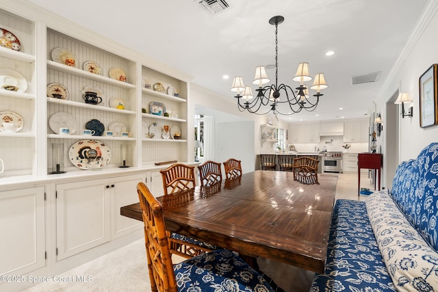 dining room featuring an inviting chandelier and ornamental molding