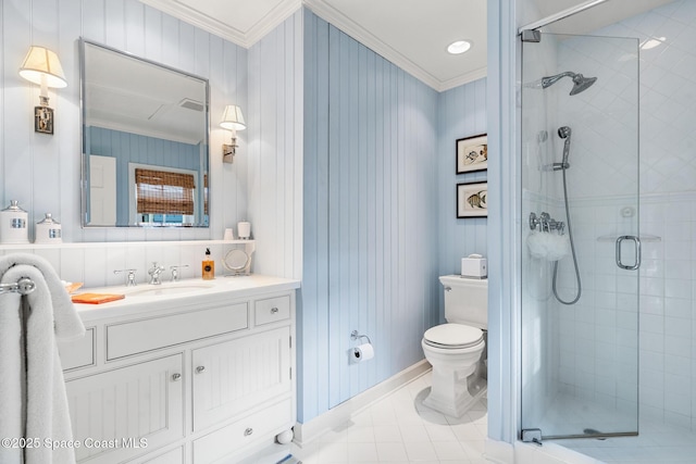 bathroom with a shower with door, crown molding, and vanity