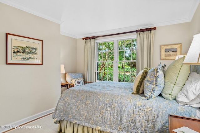 bedroom with carpet flooring and ornamental molding