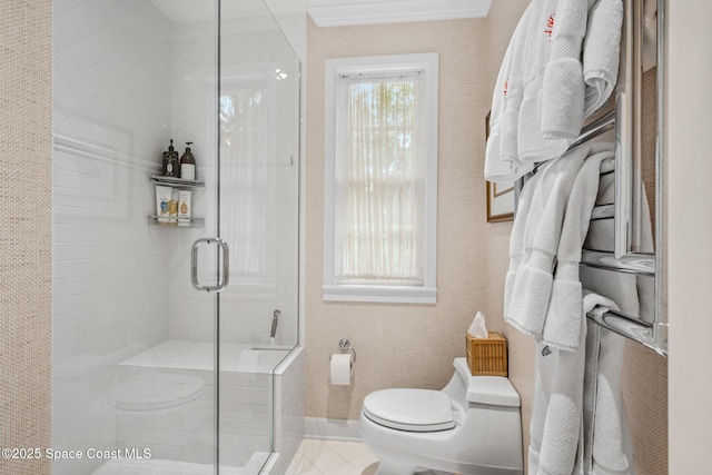 bathroom with toilet, an enclosed shower, and tile patterned flooring