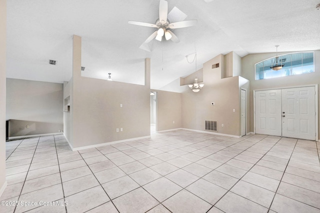 interior space featuring high vaulted ceiling, a textured ceiling, and ceiling fan