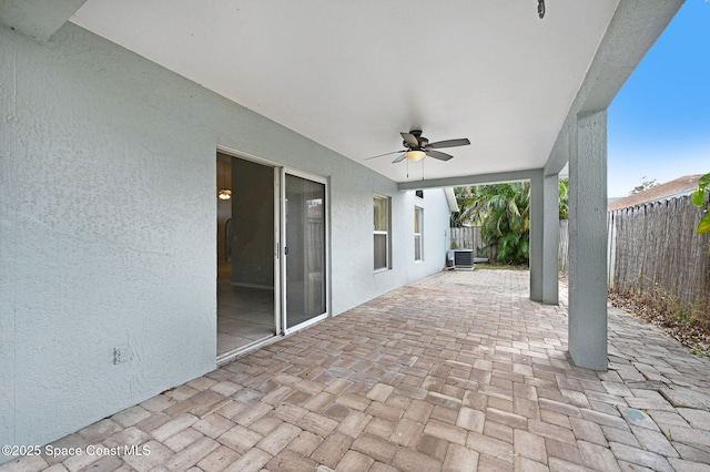 view of patio featuring ceiling fan and central air condition unit