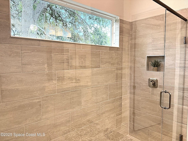 full bathroom with a stall shower
