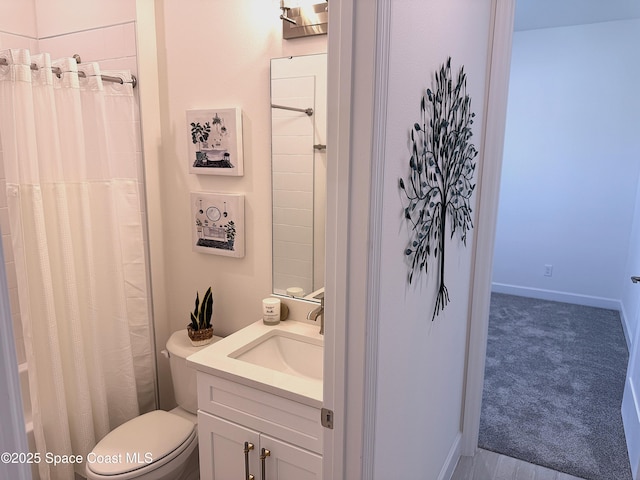 full bathroom featuring vanity, toilet, and shower / tub combo