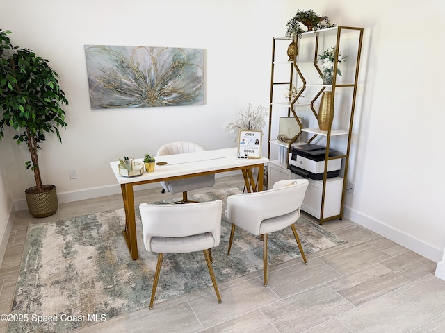 office area featuring baseboards
