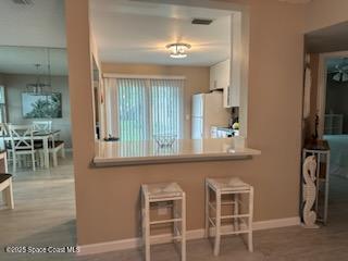 kitchen featuring white refrigerator