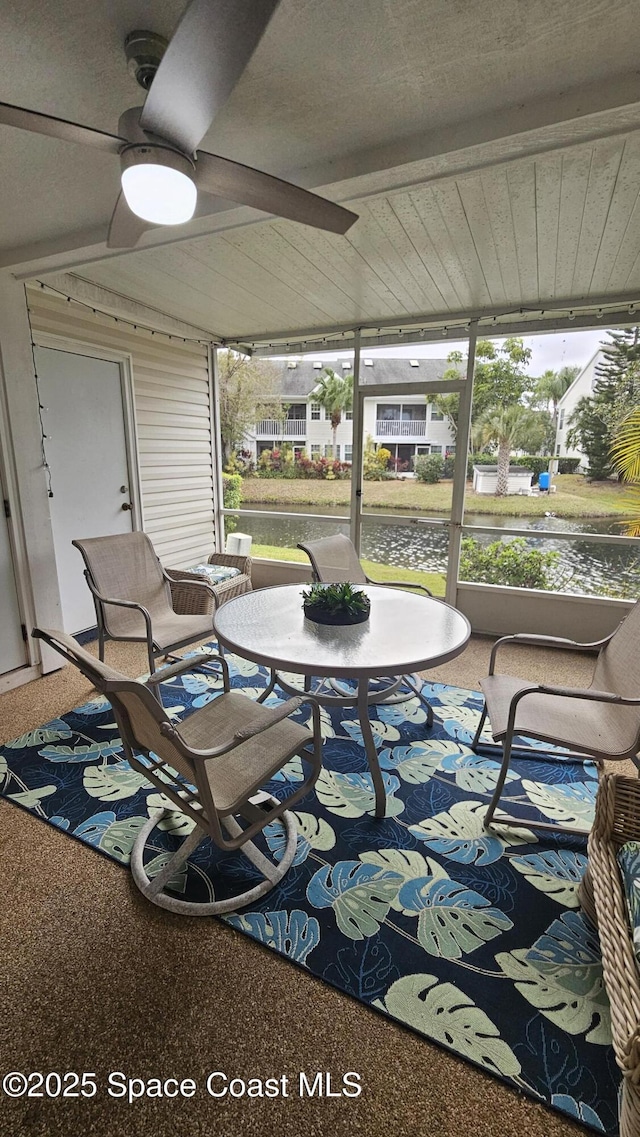 sunroom / solarium with ceiling fan