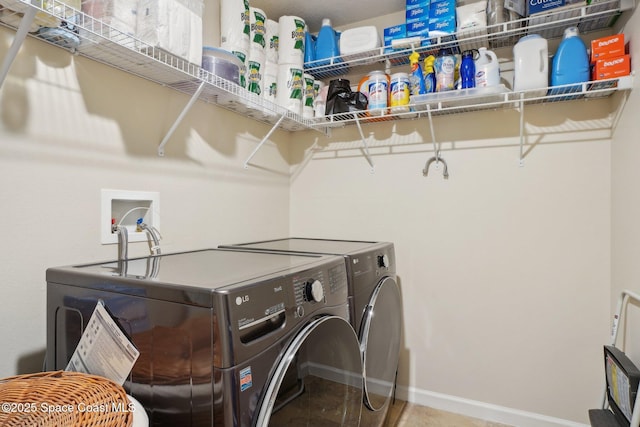 laundry area with washer and clothes dryer