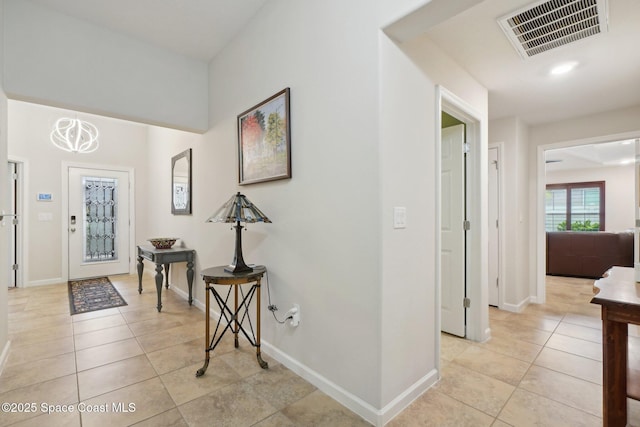 entryway featuring light tile patterned floors