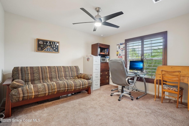 office featuring light colored carpet and ceiling fan