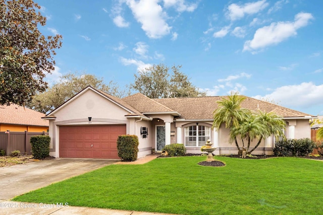 ranch-style house featuring driveway, stucco siding, an attached garage, fence, and a front yard