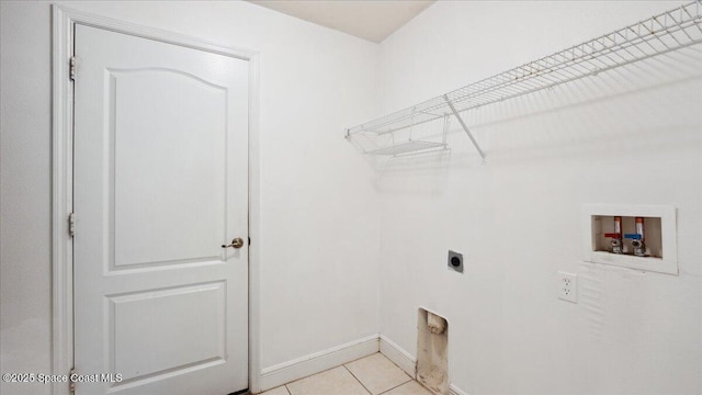 laundry room with washer hookup, hookup for an electric dryer, and light tile patterned floors