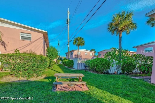 view of yard with fence