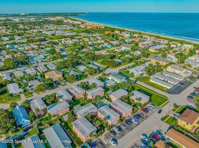 aerial view with a view of the beach and a water view