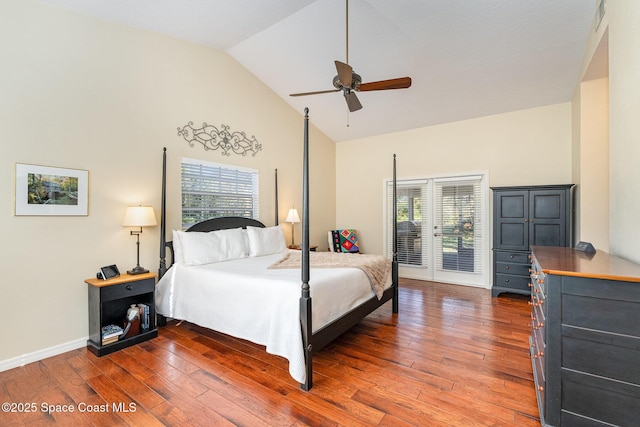 bedroom featuring wood-type flooring, high vaulted ceiling, access to exterior, and ceiling fan