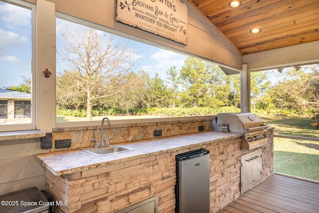 view of patio / terrace featuring sink, exterior kitchen, and grilling area