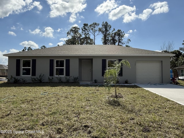 ranch-style house featuring a garage and a front lawn