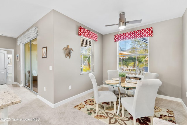 dining area with ceiling fan