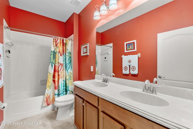 full bathroom featuring vanity, toilet, and shower / bath combo with shower curtain