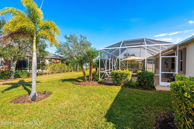 view of yard featuring a lanai