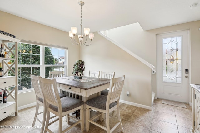 dining room featuring a chandelier