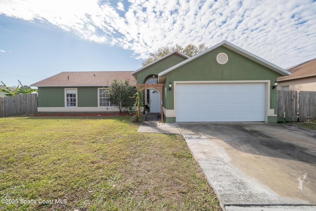 ranch-style house with a garage and a front yard