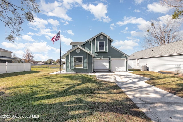 view of front property featuring a front yard and a garage