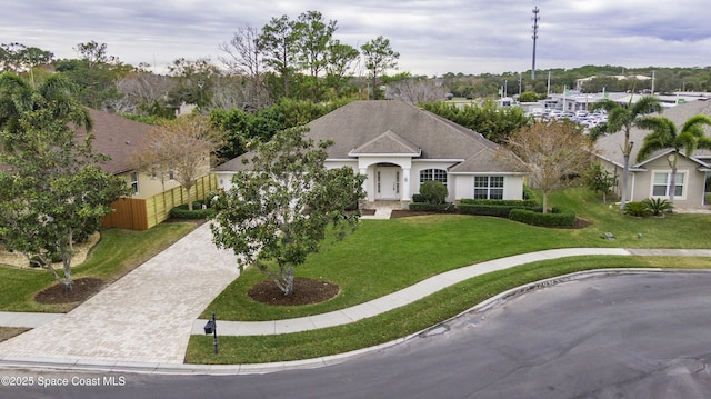 view of front of home with a front lawn