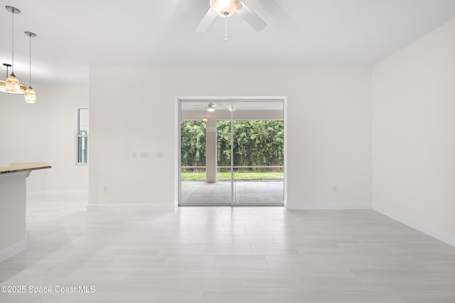 empty room with ceiling fan