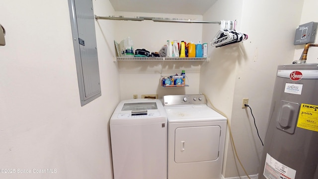 washroom featuring independent washer and dryer, electric panel, and electric water heater