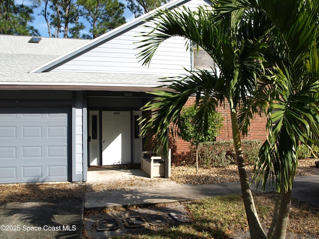 exterior space featuring a garage