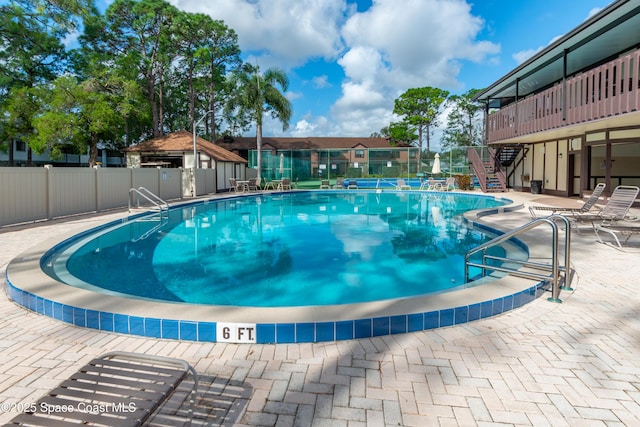 view of pool with a patio