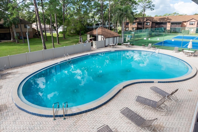 view of pool with a patio