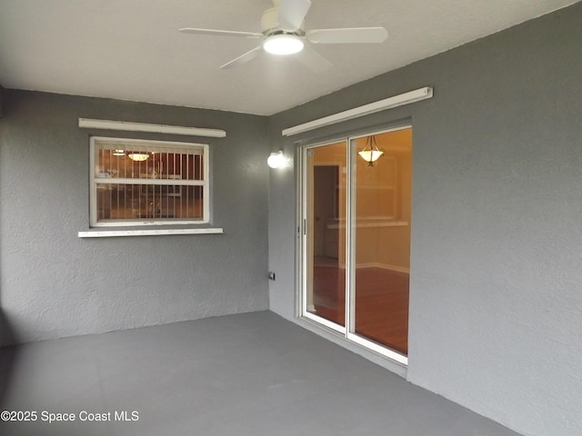 view of patio / terrace with ceiling fan