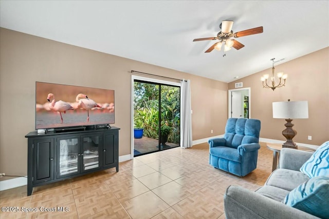 living room with vaulted ceiling, light parquet floors, and ceiling fan with notable chandelier