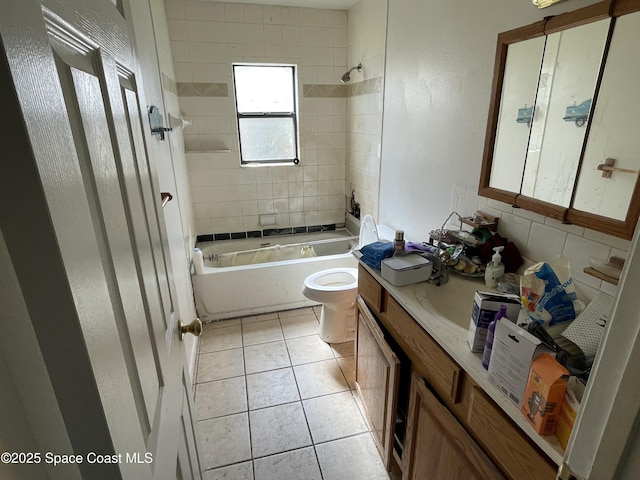 full bathroom with tiled shower / bath combo, vanity, tasteful backsplash, tile patterned floors, and toilet