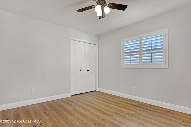 unfurnished bedroom with a closet, ceiling fan, and light hardwood / wood-style floors