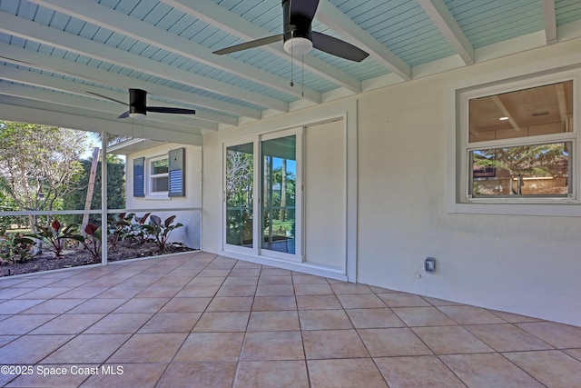 view of patio featuring ceiling fan