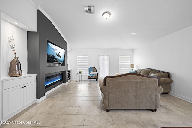 living room with light tile patterned floors