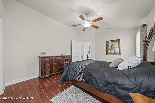 bedroom featuring ceiling fan and lofted ceiling