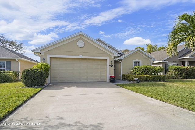 view of front of house featuring a garage and a front lawn