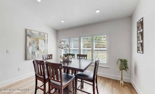 dining room featuring light hardwood / wood-style floors