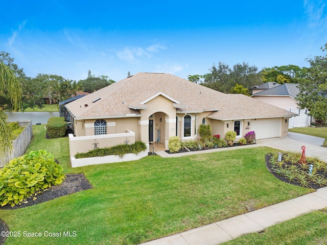 single story home with a front yard and a garage