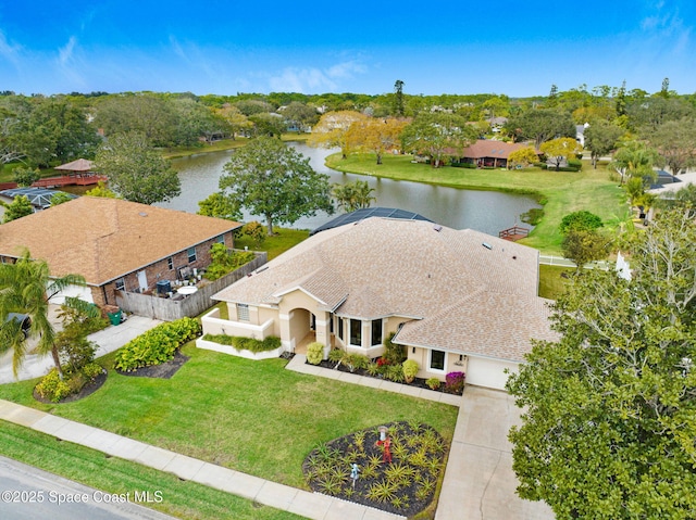 drone / aerial view featuring a water view